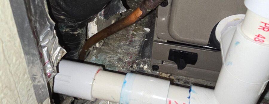 Exposed plumbing and HVAC components during residential mold remediation project in Bradenton Florida