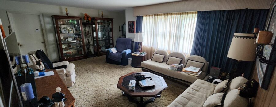 Residential hurricane water damage project showing hardwood floor moisture assessment and structural drying in Harbor Acres, Sarasota, Florida.